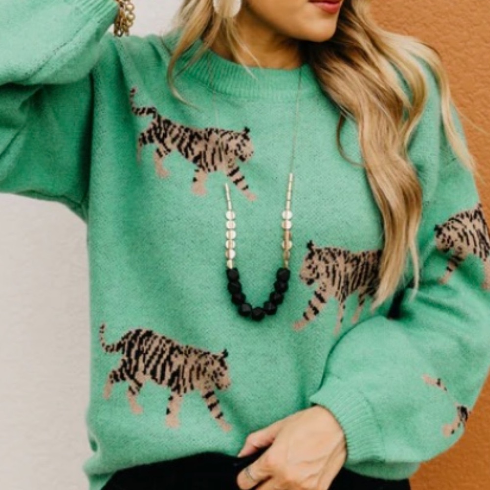 BiBi Tiger Sweater. Size medium. New with tags